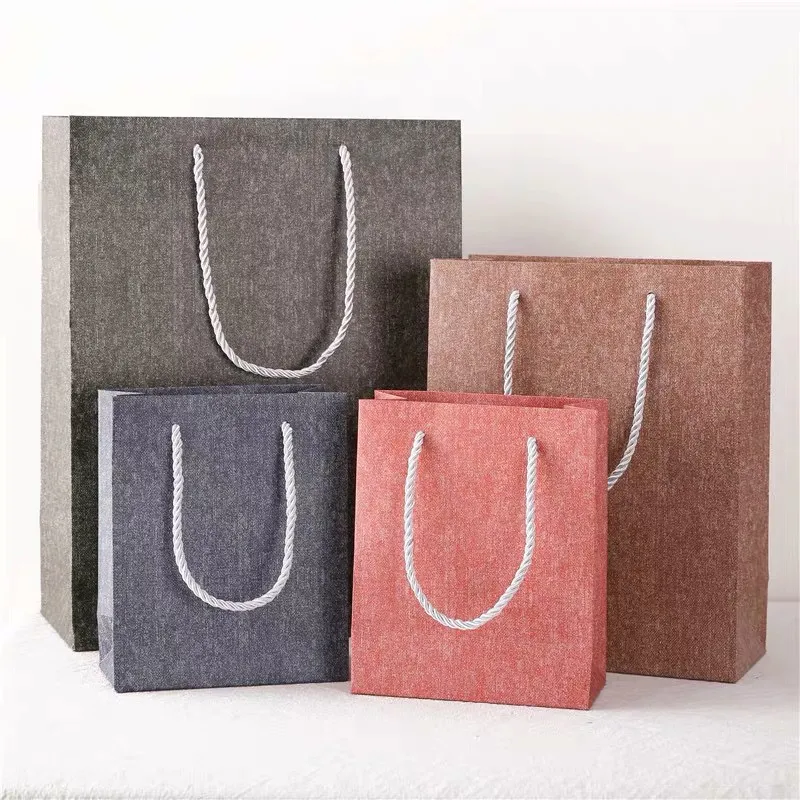 Customize simulation cloth texture paper gift bag for clothing shopping